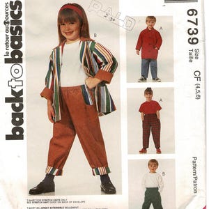 May include: A sewing pattern for children's clothing. The pattern includes instructions for making a striped shirt, a red shirt, and a white shirt. The pattern is for sizes 4, 5, and 6. The pattern is from McCall's and is called "Back to Basics".