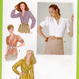 May include: A vintage Simplicity sewing pattern, size 10 Miss, featuring illustrations of blouses and jackets. The pattern includes images of a purple blouse, a white blouse, a peach-colored blouse, and a gold jacket.