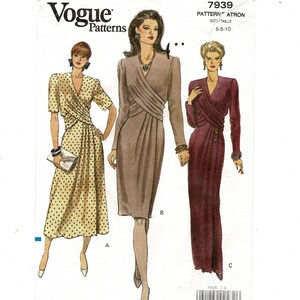 May include: Vogue Patterns sewing pattern featuring three dress designs. The dresses include a polka dot wrap dress, a long-sleeved taupe dress, and a long burgundy dress with button details. The pattern is labeled 7939, with sizes 6-8-10.