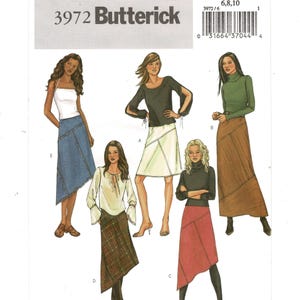 May include: A Butterick sewing pattern featuring illustrations of various women's clothing designs. The designs include skirts, tops, and a dress. The pattern number is 3972, with additional numbers and a barcode visible.