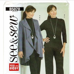 May include: A sewing pattern package with the text "see & sew" and "yes! it's easy". The package features a woman wearing a blue jacket and black pants. The pattern number is B5070.