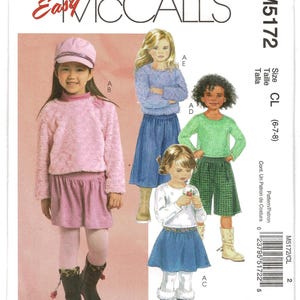 May include: Easy McCall's M5172 sewing pattern envelope for children's clothing in size CL (6-7-8). The cover features illustrations of children wearing various outfits including a pink fuzzy sweater, a blue skirt, a green top, and dark shorts.
