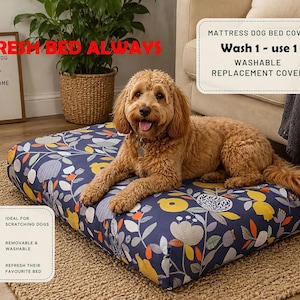 May include: A rectangular mattress dog bed cover featuring a dark blue background with a colourful floral and botanical pattern in yellow, orange, and grey. The cover includes text stating MATTRESS DOG BED COVER, Wash 1 - use 1, and WASHABLE REPLACEMENT COVER.
