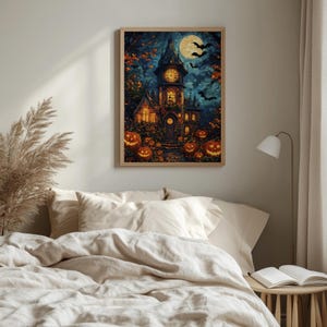 May include: A framed wall art print depicting a dark, gothic clock tower at night under a full moon. The scene features glowing orange jack-o'-lanterns scattered around the base of the building, with silhouettes of flying bats in the sky.