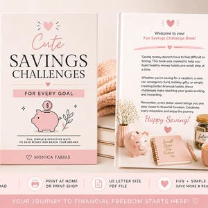 May include: A softcover book titled Cute Savings Challenges For Every Goal by Monica Farias, featuring a pink piggy bank illustration on the cover. The interior page displays text about financial habits, alongside a small pink piggy bank, a spiral notebook, a glass jar, and a mug.