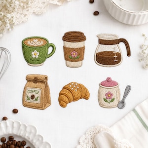 May include: Six embroidered patches featuring coffee-themed items: a green mug with latte art and a flower, a tan to-go cup with a flower, a glass coffee carafe, a tan coffee bag labeled COFFEE, a golden-brown croissant, and a sugar bowl with a spoon.