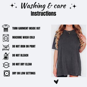 May include: A charcoal gray t-shirt with washing and care instructions. The text reads: Washing & care Instructions, TURN GARMENT INSIDE OUT, MACHINE WASH COLD, DO NOT IRON ON PRINT, DO NOT BLEACH, DO NOT DRY CLEAN, DRY ON LOW SETTINGS. Icons accompany each step.