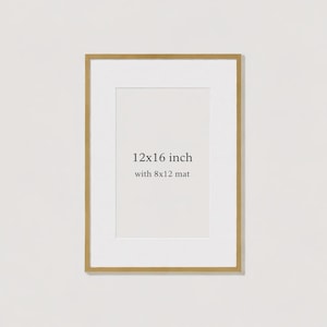 May include: A rectangular picture frame with a thin gold-toned metallic border and a white mat board. The centre of the mat features the printed text 12x16 inch with 8x12 mat, indicating the frame dimensions and the internal mat opening size.