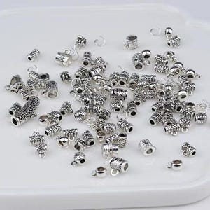 Tibetaans zilveren tussenkralen, diverse antieke metalen kralenkapjes voor het rijgen van armbanden (1 zakje van 50 g)
