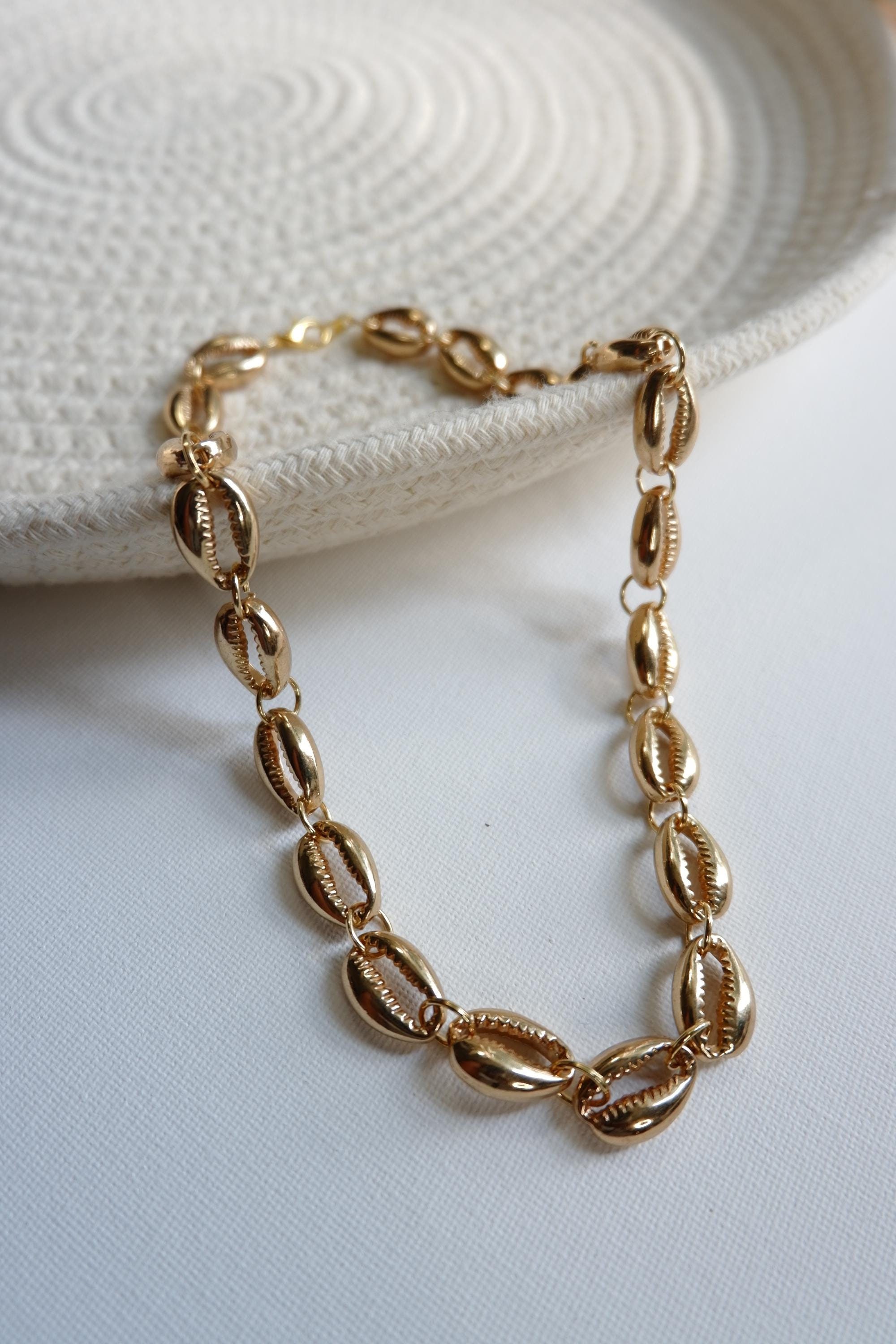Gold cowrie shell choker deals