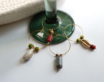 Set of 4 Glass Bead, Brass, and Cowrie Shell Wine Charms