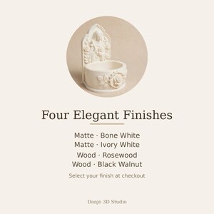 May include: A cream-colored wall-mounted holy water font featuring a sculpted figure of a saint holding a cross, surrounded by floral relief details. The text reads: Four Elegant Finishes, Matte Bone White, Matte Ivory White, Wood Rosewood, Wood Black Walnut, Danjo 3D Studio.