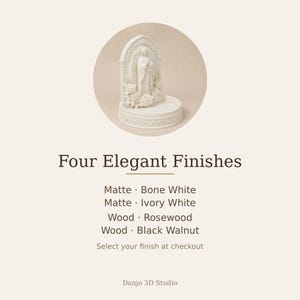 May include: A white, circular, three-dimensional religious figurine stand featuring a central arched relief of a figure surrounded by roses. The text reads: Four Elegant Finishes, Matte Bone White, Matte Ivory White, Wood Rosewood, Wood Black Walnut, Select your finish at checkout, Danjo 3D Studio.