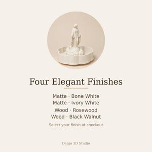 May include: A white figurine of a standing figure with arms outstretched, placed inside a scalloped circular tray. Text reads: Four Elegant Finishes, Matte Bone White, Matte Ivory White, Wood Rosewood, Wood Black Walnut, Select your finish at checkout, Danjo 3D Studio.