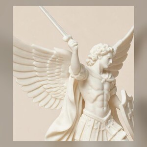 May include: A white, matte-finish sculpture of a winged figure in armor, holding a sword raised in the right hand and a shield in the left. The figure features detailed feathered wings, a muscular torso, and a draped cloak over the shoulder.