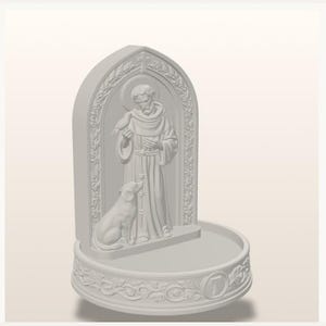 May include: A matte white sculptural basin featuring a raised relief of a robed figure with a halo, holding a bird, with a dog sitting at their feet. The arched back panel is decorated with leaf motifs, and the circular base displays a letter T.