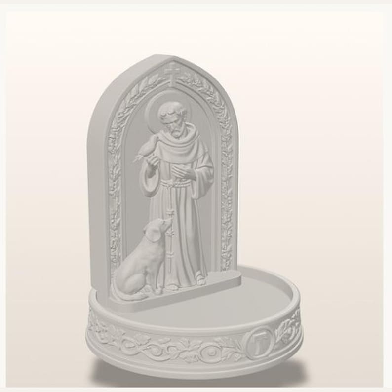 May include: A matte white sculptural basin featuring a raised relief of a robed figure with a halo, holding a bird, with a dog sitting at their feet. The arched back panel is decorated with leaf motifs, and the circular base displays a letter T.
