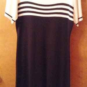 Blue and white knit dress by John Roberts.