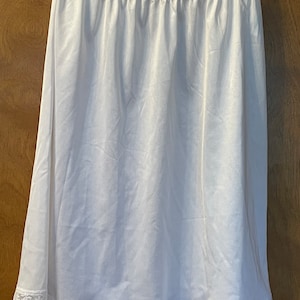 Vintage half slip with lace trim.