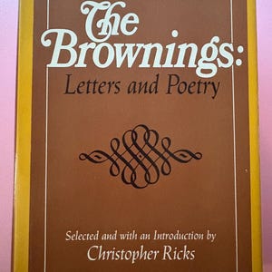 May include: A hardcover book titled "The Brownings: Letters and Poetry" with a brown cover and white text. The book has a decorative swirl design and is selected and introduced by Christopher Ricks. The book's spine is yellow.