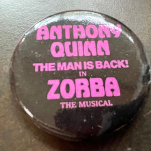 Promotional button for the production of Zorba with Anthony Quinn.