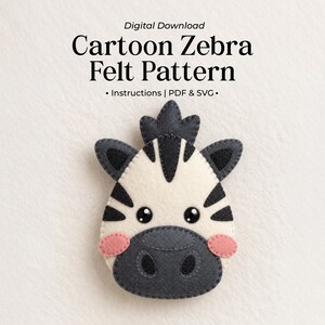 May include: A digital download for a cartoon zebra felt pattern featuring instructions, PDF, and SVG files. The image shows a stitched felt zebra head with cream, dark grey, and pink accents, including black eyes and a dark grey muzzle.