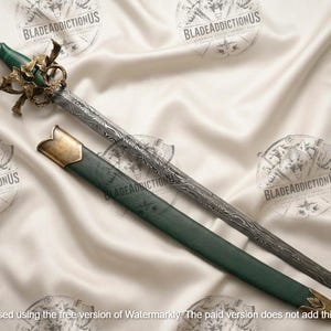 May include: A sword with a patterned Damascus steel blade, a green handle, and an ornate gold-coloured metal guard featuring leaf-like details. The sword is accompanied by a matching green scabbard with gold-coloured metal accents at both ends.