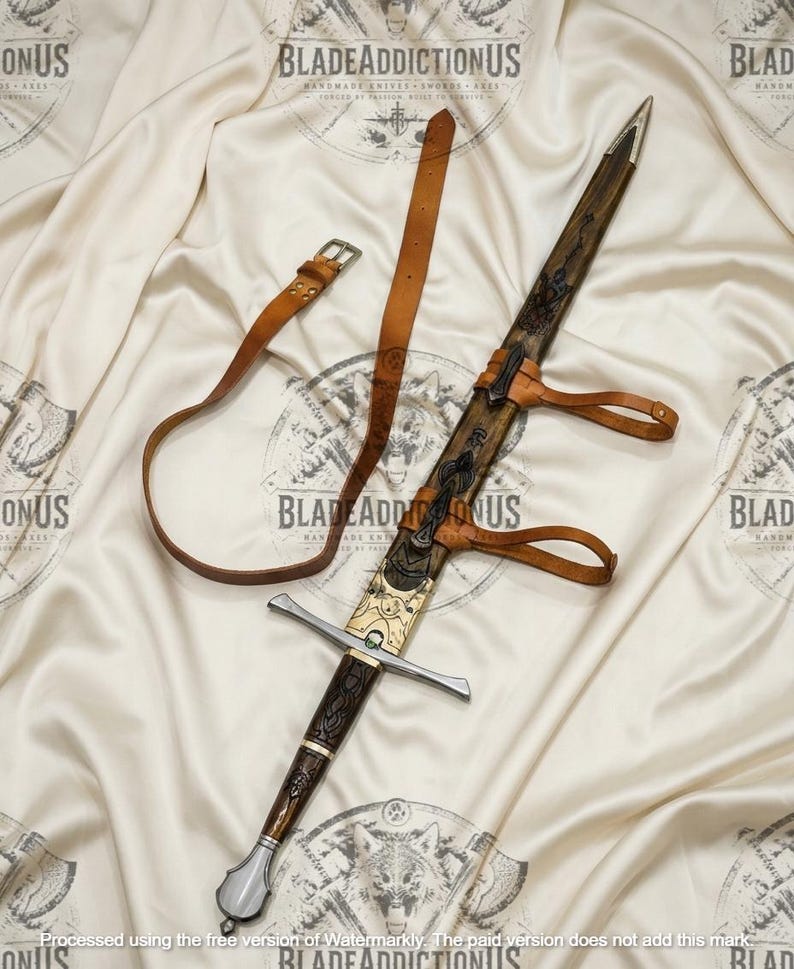 May include: A sword with a dark wood handle featuring intricate carvings, a brass crossguard, and a matching wooden scabbard with brass accents. A tan leather belt with a metal buckle is attached to the scabbard, which has two leather straps for carrying.