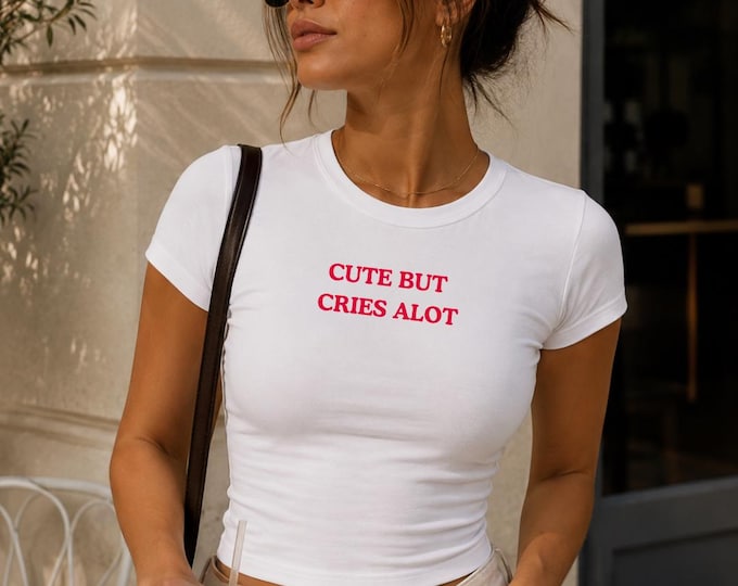 Fitted White T-Shirt | Red Text Graphic "But Cries Alot"