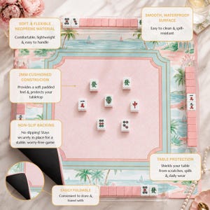 May include: A square mahjong mat featuring a tropical beach scene with palm trees and sailboats in pink and blue tones. The mat has a 2mm cushioned construction, a non-slip black backing, and a smooth, waterproof surface. It is foldable.