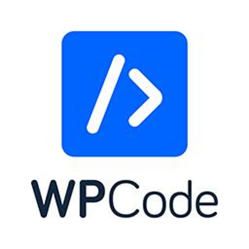 May include: A square blue icon with rounded corners featuring a white forward slash and a white greater-than symbol centered inside. Below the icon, the text WPCode is written in a clean, dark, sans-serif font on a plain white background.