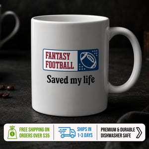 May include: A white ceramic mug featuring a rectangular blue and white graphic with the text FANTASY FOOTBALL in red and blue letters, accompanied by a football icon. Below the graphic, the text Saved my life is printed in black.