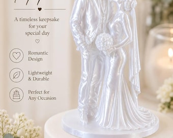 May include: A white glossy wedding cake topper featuring a couple in formal attire, with the person on the left wearing a cowboy hat and the person on the right holding a bouquet. The text reads: WEDDING CAKE Topper, A timeless keepsake for your special day, Romantic Design, Lightweight & Durable, Perfect for Any Occasion, Made with Love for Your Special Day.