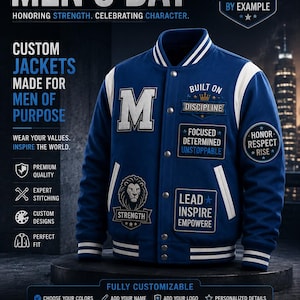 May include: A blue varsity jacket with white sleeves and striped ribbed trim. The jacket features various embroidered patches including a large letter M, a lion head with the word STRENGTH, and text reading BUILT ON DISCIPLINE, FOCUSED DETERMINED UNSTOPPABLE, LEAD INSPIRE EMPOWERE, and HONOR RESPECT RISE.