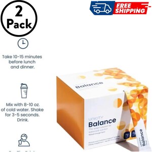 May include: A two-pack of Unicity Balance dietary supplement boxes with orange circular patterns. The packaging includes instructions to take 10-15 minutes before lunch and dinner, and to mix one packet with 8-10 oz. of cold water and shake well.
