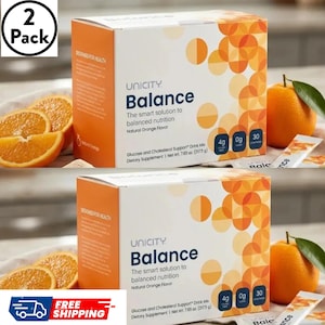 May include: Two boxes of Unicity Balance Glucose and Cholesterol Support drink mix with natural orange flavor. Each box has a net weight of 7.65 oz. The packaging is white and orange with circular patterns, featuring text and three small icons.