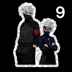 May include: A sticker featuring two anime characters with spiky silver hair and dark face masks. The taller character wears a black jacket with a red armband, while the shorter character wears a black jacket and a headband. The number 9 is visible.