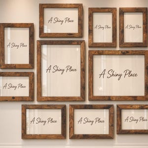 May include: A gallery wall arrangement of ten rectangular wooden picture frames with a distressed brown finish. Each frame contains a white insert with the text A Shiny Place printed in a dark brown cursive script in the center of the display.