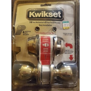 May include: A Kwikset combo pack in clear plastic packaging containing a gold-toned single cylinder deadbolt and a matching keyed entry door knob set. The packaging includes text stating 10 Year Mechanical & 5 Year Finish Warranty, 4 identical keys included, and single cylinder deadbolt keyed entry.