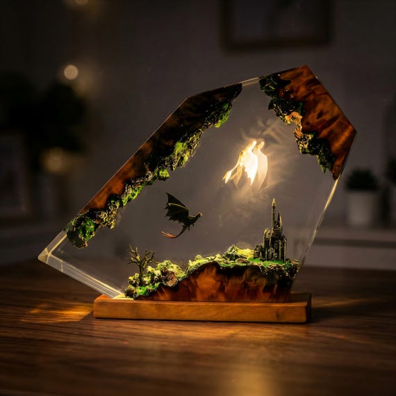A hand-cast resin dragon coiled around a glowing moon castle — the kind of lamp that makes every guest ask 'where did you get that?'