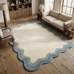 Scalloped wavy border rug with blue edge placed in a rustic living room with wooden furniture and natural light