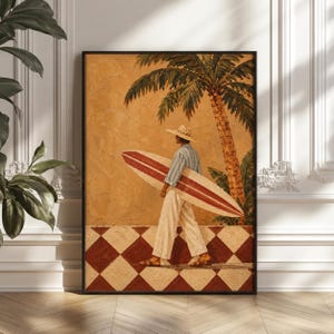 May include: A framed wall art print depicting a person wearing a straw hat, a blue and white striped shirt, and light-colored trousers, walking while carrying a surfboard with a red stripe. The background features a palm tree and a checkered floor.
