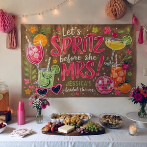 May include: A rectangular banner featuring the text Let's SPRITZ before she MRS! JESSICA'S bridal shower. The design includes illustrations of colorful cocktails, a disco ball, heart-shaped sunglasses, citrus slices, and flowers on a tan background.