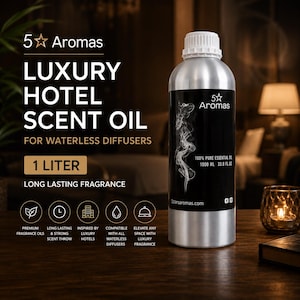 May include: A silver-colored metal bottle containing 1 liter of 5 Aromas luxury hotel scent oil for waterless diffusers. The black label features white text, a smoke graphic, and the volume 1000 ml 33.8 fl oz with a white screw-top cap.