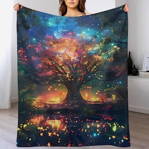 Puede incluir: Una manta rectangular con un estampado digital vibrante y colorido de un gran árbol centrado en un paisaje nocturno oscuro y estrellado. El árbol está iluminado con luz naranja, rosa y amarilla, con reflejos visibles en un estanque oscuro.