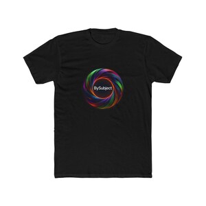 May include: A black short-sleeved t-shirt featuring a circular graphic on the chest. The graphic consists of a vibrant, multi-colored, swirling vortex pattern in shades of red, blue, green, and purple, with the text BySubject printed in white.