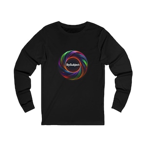 May include: A black long-sleeve shirt featuring a circular graphic on the chest. The graphic consists of a vibrant, multi-colored, swirling vortex pattern in shades of red, blue, green, and purple, with the text BySubject printed in white in the center.