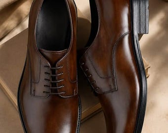 zapatos de cuero marrón