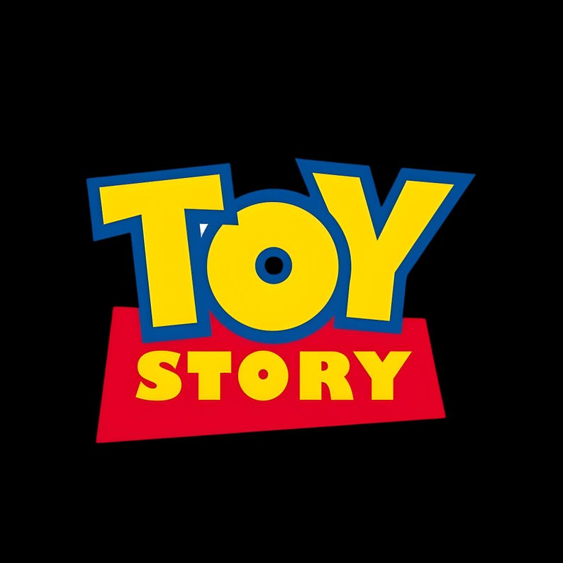 May include: The Toy Story logo features the word TOY in large yellow letters with a thick blue outline, positioned above the word STORY in smaller yellow letters set against a red trapezoidal background, all displayed on a solid black field.