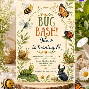 May include: A rectangular invitation card with a cream background featuring watercolor illustrations of a bee, butterfly, dragonfly, ladybug, snail, caterpillar, grasshopper, and beetle. The text reads BUG BASH! Oliver is turning 8! SATURDAY | JULY 20 | 2:00 PM Sunny Meadow Garden, 145 Willow Lane, Maple Creek RSVP by July 10 to Emma | 555-2147.
